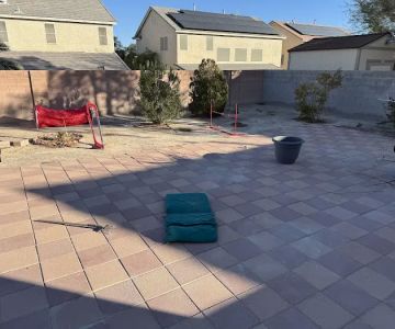 Kaurie’s fully fenced yard with agility trading course